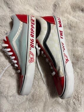Vintage Vans Red, White, Black Low-Top Sneakers with Checkerboard Panel
Unisex